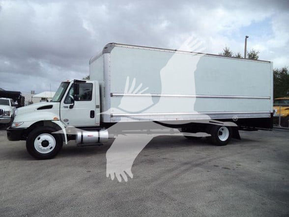 2019 International DURASTAR 4300 box truck side view with silver cargo box and white cab