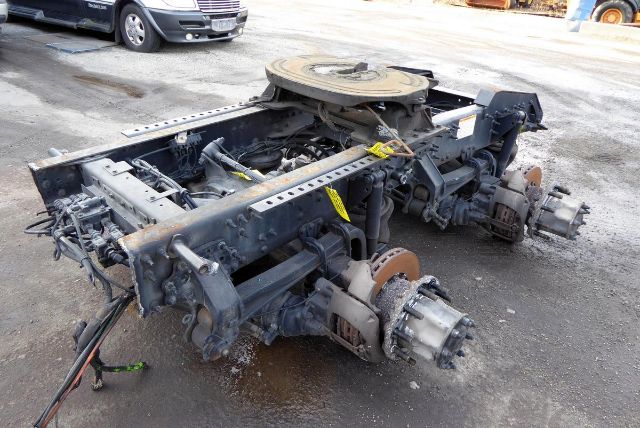 Meritor MT4014X rear truck axle assembly showing wheel hubs, brake components, and suspension frame.