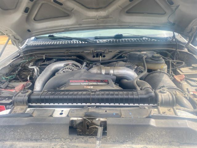 Ford F-550 engine bay with Power Stroke Turbo Diesel label visible on intake cover.