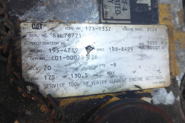 Caterpillar engine data plate with model 3126 showing serial number 8YL78771, AR no 195-4289, OEM  C01-00023-226, horsepower 130.5, torque 175 ft-lbs, service tool note.