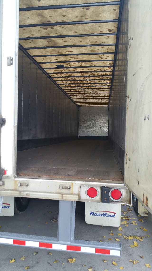 Interior of a 2003 Great Dane 53ft dry van trailer with air ride suspension, showing empty cargo area, ribbed ceiling, and rear light cluster.