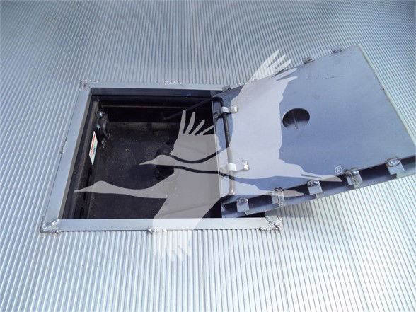 Ram 5500 storage hatch in truck bed with open hatch revealing interior cavity.