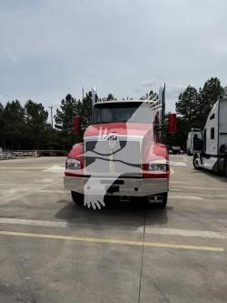 Kenworth T880 truck front view showing grille, headlights, and bumper.