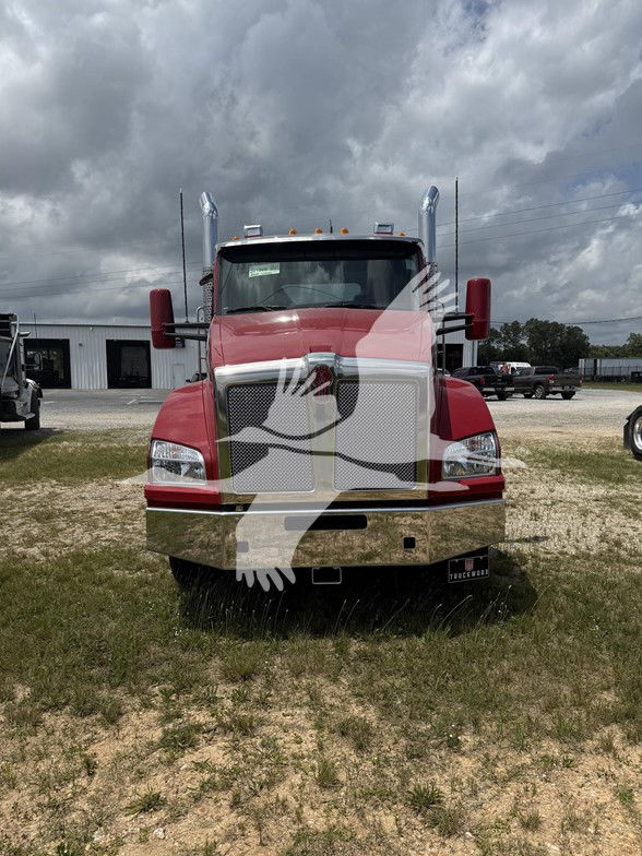 Kenworth T880 truck front view with large chrome grille and tall exhaust stacks in red paint; front bumper visible; stock number TJ201908.