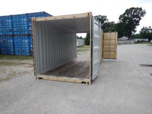 20' double door shipping storage container in an outdoor lot with another container in background.