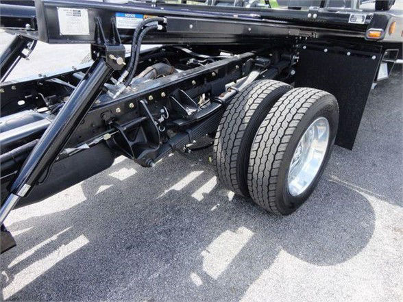 Ram 5500 chassis with dual rear wheels and suspension components visible.