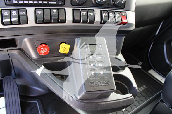 Kenworth T880 interior gear selector and dashboard controls with ignition and switches visible.