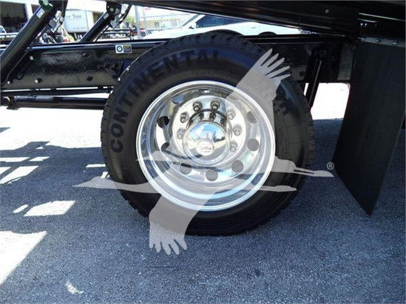 Kenworth T280 wheel and tire undercarriage view with steel rim, black frame, and watermark graphic across image.