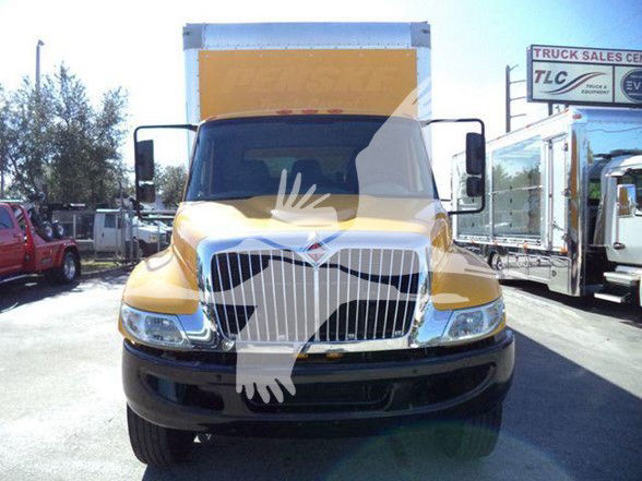 Front view of a yellow and white 2019 International DURASTAR 4300 box truck with large chrome grille and bumper.