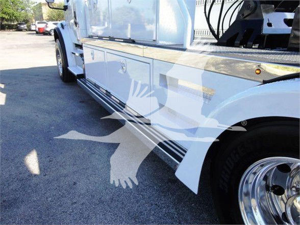 Truck side view showing lower side panels and wheel, Freightliner M2 106 equipment