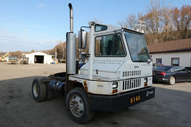 Ottawa 30 yard truck showing cab, exhaust stack, and front grille with number 8148 on bumper.