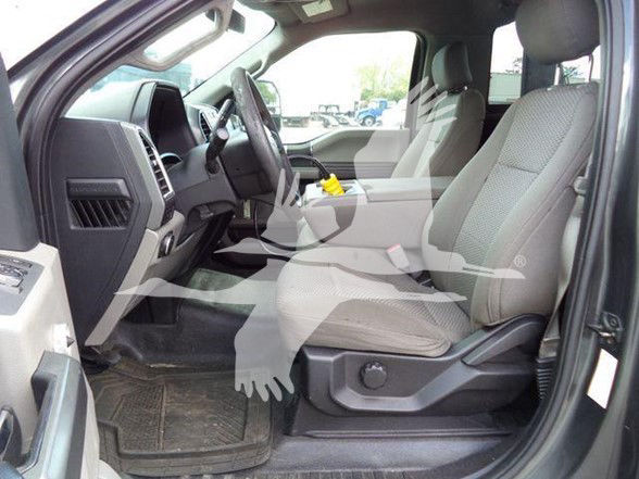Ford F-450 interior showing front two Seats and dashboard view.