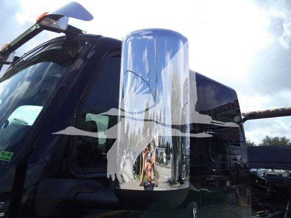 Truck cab side window with reflection; no legible labels visible on the image portion.