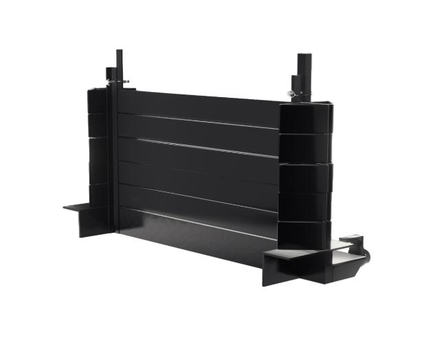 Trailer parts accessory showing a black metal assembly with vertical side supports and horizontal panels.