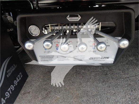 Mack MD6 control panel showing multiple levers and gauges with labels and a small gauge on left.