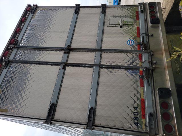 Rear view of a silver utility trailer with diamond plate panels and double doors, number 4804, red and white reflective tape, and rear lights.