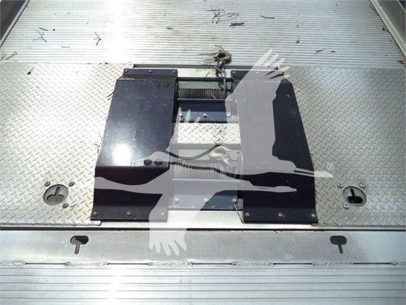 Kenworth T370 truck bed anchor point or mounting platform on a metal cargo deck.
