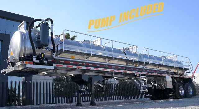 Vacuum trailer with aluminum tank and pump included, large dual axle rear, catwalk and ladder, Truxton logo visible, pump included text overlaid.