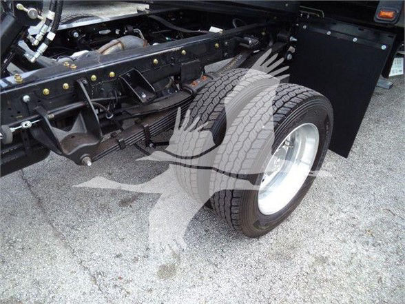 Ram 5500 chassis and front wheel showing suspension, frame, and tire