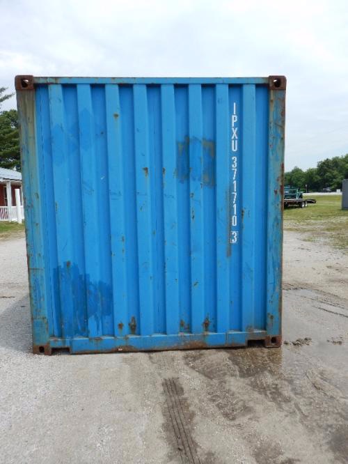 Vertical blue wind/weather-tight shipping container, rectangular steel walls, corner fittings, serial numbers along right edge.