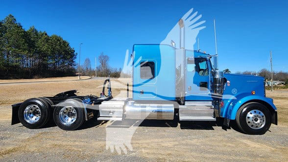 Kenworth W900L conventional sleeper truck side view with blue cab and chrome fuel tanks, three axles, no visible license plate, stock SR183550.
