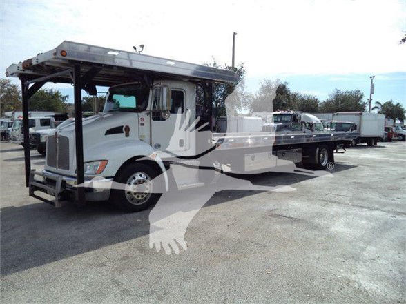 Kenworth T370 tow truck with flatbed, front view, stock number KW4CARCARRIER visible in listing context