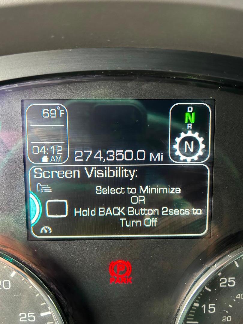 Kenworth T680 dashboard showing 274,350.0 miles and gear readout, with 69°F outside temperature, 04:12 AM time, and Park brake indicator.