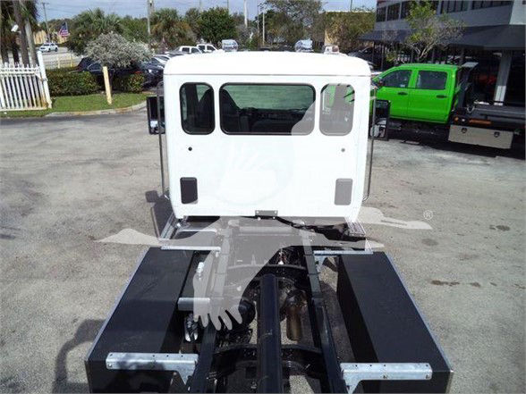 Kenworth T280 truck cab rear view showing chassis and frame rails.
