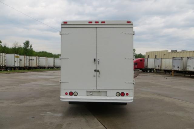 Back view of a white 2007 Freightliner MT45 step van with double rear doors and dual rear lights.