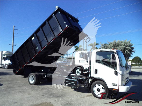 Isuzu NRR dump truck with hydraulic bed raised for dumping, white cab, black dump bed, stock number 18FTDUMPNRRFM.