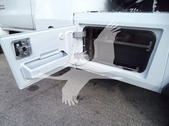 Chevrolet Silverado 6500HD truck with side door open, showing storage compartment and hinge.
