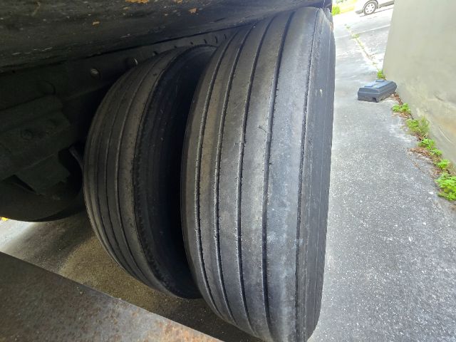 Great Dane SS trailer rear dual tires showing multiple wide tread grooves and side profile.