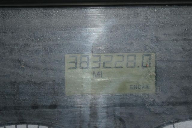 Instrument cluster showing mileage 383,238.0 miles and engine label.