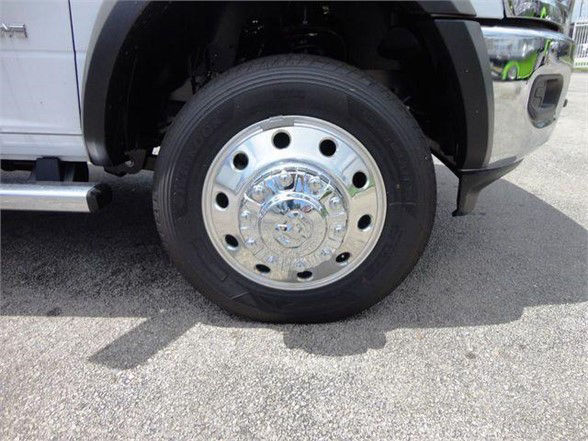 Truck wheel with chrome hubcap and tire on Ram 4500 front right side.