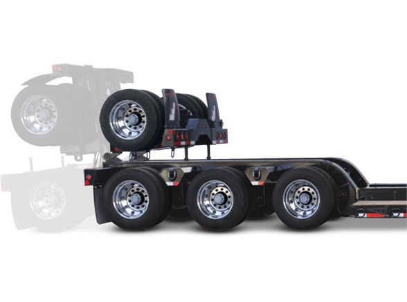  Fontaine 4th axle flip lowboy trailer showing multiple axles and spare tire mounted on upper deck.