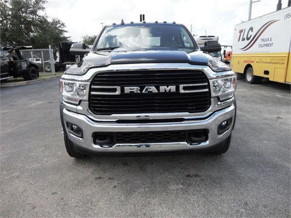 Ram 4500 HD front view showing bold grille with DRAMC lettering and chrome bumper.