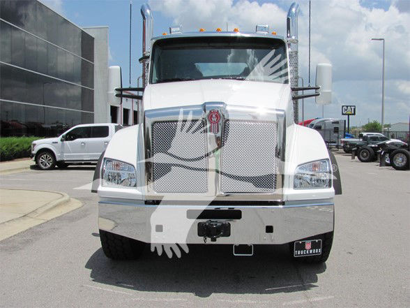 Kenworth T880 front view in white with chrome grille and bumper, elevated cab, and side mirrors; stock number TJ219543LM visible.