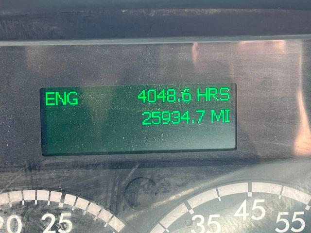 Dashboard display showing ENG 4048.6 HRS and 25934.7 MI.