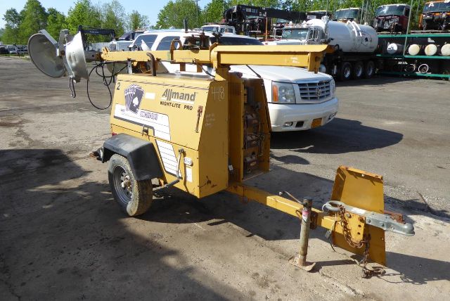 Allmand Night Lite Pro towable light tower mounted on trailer with extendable mast and floodlight.