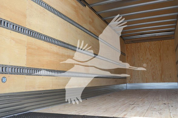 Stock image of an empty truck trailer interior. No visible vehicle details or text on the equipment.