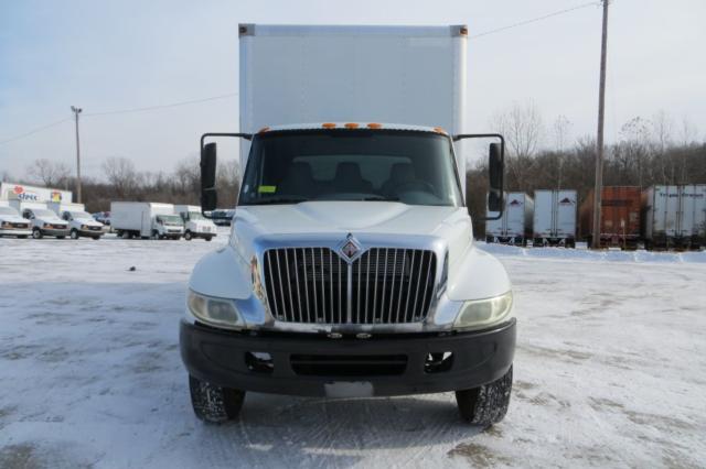 International 4300 box truck front view in a snowy lot