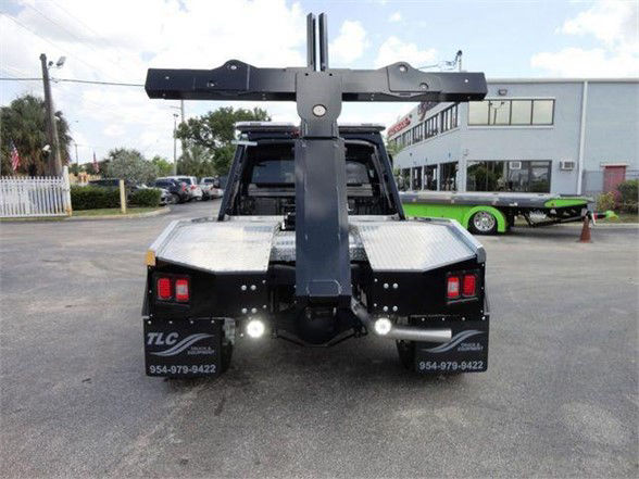 Ram 4500 HD SLT rear view showing heavy-duty towing hitch with vertical mount and reflector lights.