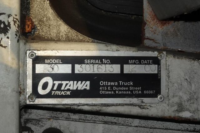 Ottawa Truck plate showing MODEL 60, SERIAL NO. 301613, MFG. DATE 4 00? (illegible) with Ottawa Truck branding and address.