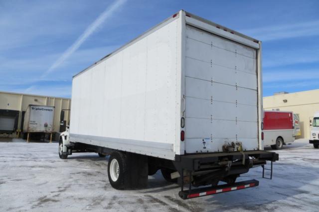 Box truck rear and side view showing cargo box, tail lights, and rear bumper.