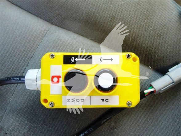 Yellow airbag deactivation/seat belt switch module in a Ford E350 SD vehicle showing wiring harness and connectors.