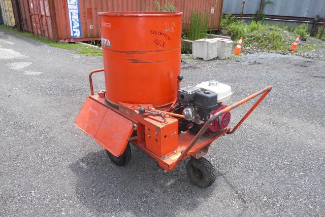 Agri-Metal CA8064 portable cement mixer or auger with orange drum and engine mounted on small wheeled frame.