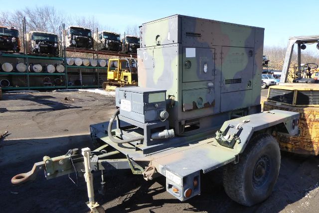 2007 Fermont MEP-804A trucking equipment on trailer with camouflage metal enclosure and engine/generator unit mounted on a dual-axle chassis.