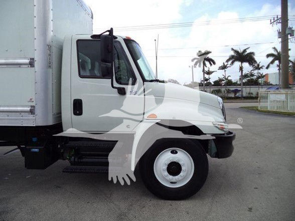 Truck side view showing International Durastar 4300 cab with cargo box. Visible text on image is limited to stock/branding from listing.
