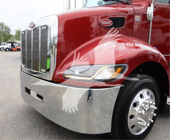 Peterbilt 337 front-left view showing chrome grille, maroon cab, headlight, and polished bumper with Peterbilt badge.