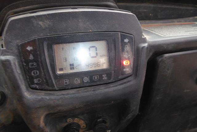 Dashboard display of a 2018 Kubota RTV-X1140 showing speed 0 mph, hour meter 4996.2, and various indicator icons.